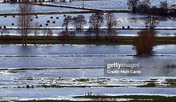 Flood water can be seen in fields surrounding the Glastonbury Tor on the Somerset Levels, on November 25, 2012 near Glastonbury, England. Another...