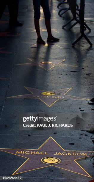 Michael Jackson's star on the Hollywood Walk of Fame is seen at sunrise in Los Angeles, California, June 30, 2009. Michael Jackson's body will make a...