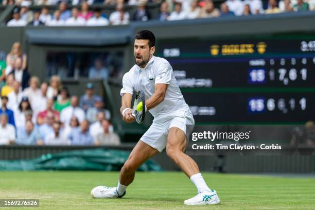 Novak Djokovic of Serbia in action against Carlos Alcaraz of Spain in the Gentlemen's Singles Final match on Centre Court during the Wimbledon Lawn...