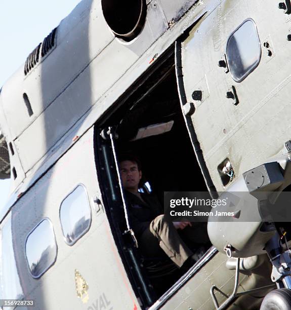 Tom Cruise is sighted flying in an RAF helicopter on set for the movie 'All You Need Is Kill' being filmed in Trafalgar Square on November 25, 2012...