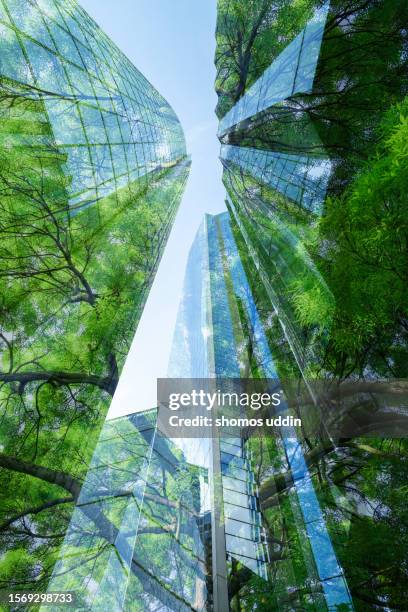 green city concept - multi layered cityscape - banker doppelbelichtung stock-fotos und bilder