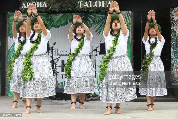 Women perform a traditional Polynesian dance during the Aloha Festival in Toronto, Ontario, Canada, on July 29, 2023. The Aloha Festival celebrated...