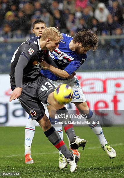 Jonathan Rossini of UC Sampdoria fights for the ball with Frederik Sorensen of Bologna FC during the Serie A match between UC Sampdoria and Bologna...