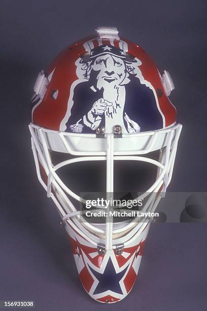 Olie Kolzig of the Washington Capitals mask before a hockey game against the New York Islanders on February 18, 1994 at the USAir Arena in Landover,...