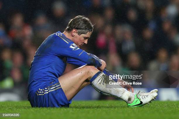 Dejected Fernando Torres of Chelsea looks on during the Barclays Premier League match between Chelsea and Manchester City at Stamford Bridge on...