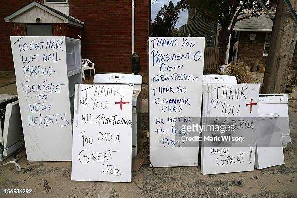 Thank you notes are written on refrigerators damaged by Superstorm Sandy on November 25, 2012 in Seaside Heights, New Jersey. New Jersey Gov....