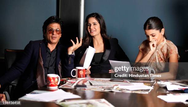 Shah Rukh Khan, Katrina Kaif and Anuksha Sharma attend an event to promote the upcoming film "Jab Tak Hai Jaan", at HT House on November 11 in New...