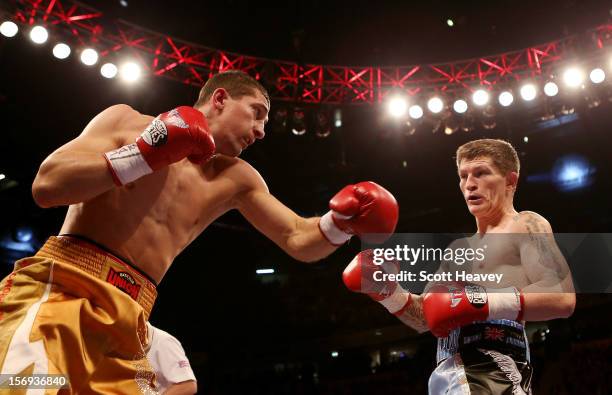 Ricky Hatton of Great Britain is caught by Vyacheslav Senchenko of Ukraine during their Welterweight bout at the MEN Arena on November 24, 2012 in...