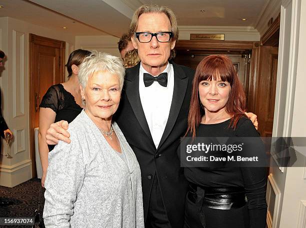 Dame Judi Dench, Bill Nighy and Finty Williams attend a drinks reception at the 58th London Evening Standard Theatre Awards in association with...