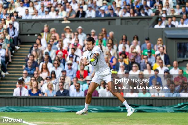 Novak Djokovic of Serbia in action against Carlos Alcaraz of Spain in the Gentlemen's Singles Final match on Centre Court during the Wimbledon Lawn...