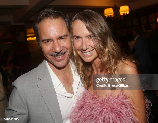 Eric McCormack and wife Janet Holden McCormack pose at the opening night after party for "The Cottage" on Broadway at Sardi's on July 24, 2023 in New...