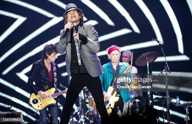 Ronnie Wood, Mick Jagger and Keith Richards of The Rolling Stones perform live at 02 Arena on November 25, 2012 in London, England.