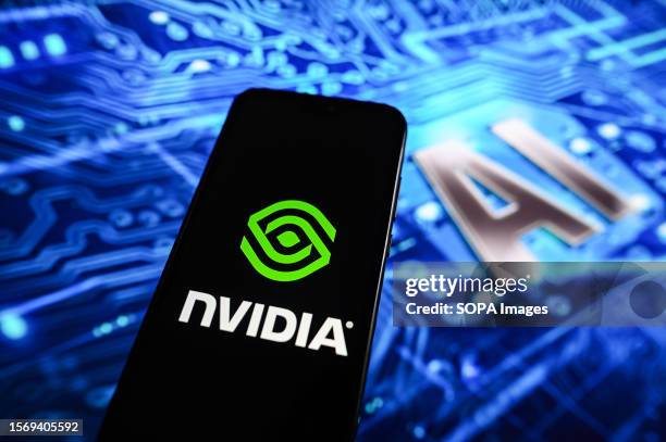 In this photo illustration, a Nvidia logo displayed on a smartphone with Artificial Intelligence design in the background.