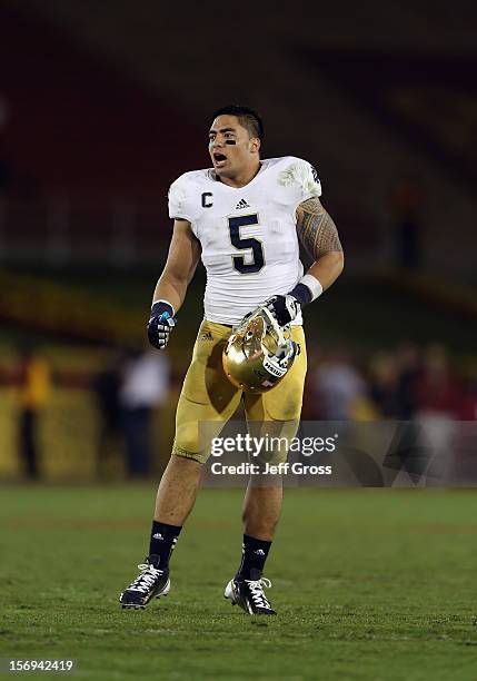 Linebacker Manti Te'o of the Notre Dame Fighting Irish looks on against the USC Trojans at Los Angeles Memorial Coliseum on November 24, 2012 in Los...