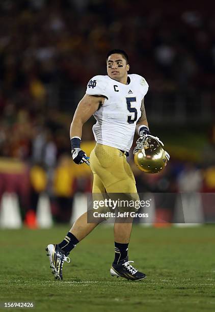 Linebacker Manti Te'o of the Notre Dame Fighting Irish looks on against the USC Trojans at Los Angeles Memorial Coliseum on November 24, 2012 in Los...