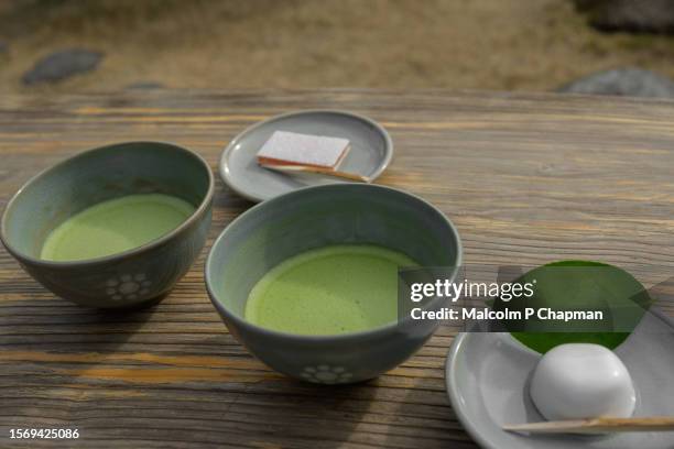 matcha tea and mochi served in kumamoto, kyushu, japan - japanese tea cup stock pictures, royalty-free photos & images