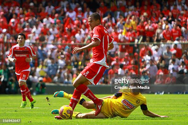 Lucas Silva of Toluca fights for the ball with Paul Aguilar of America during a match between Toluca and America as part of the Apertura 2012 Liga MX...