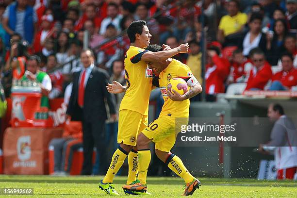Daniel Montenegro and Juan Carlos Medina of America celebrate a goal against Toluca during a match between Toluca and America as part of the Apertura...