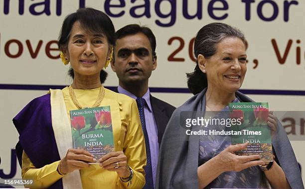 Chairperson of The National League for Democracy of Myanmar, Aung San Suu Kyi , and Chairperson of the Congress-led UPA government Sonia Gandhi pose...