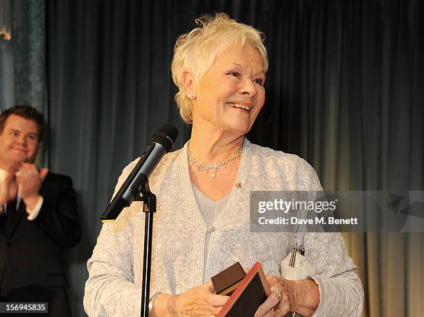 Dame Judi Dench accepts the Moscow Art Theatre's Golden Seagull award at the 58th London Evening Standard Theatre Awards in association with Burberry...