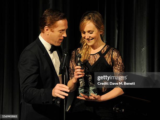 Hattie Morahan accepts the Natasha Richardson award for Best Actress for 'A Doll's House' from presenter Damian Lewis at the 58th London Evening...
