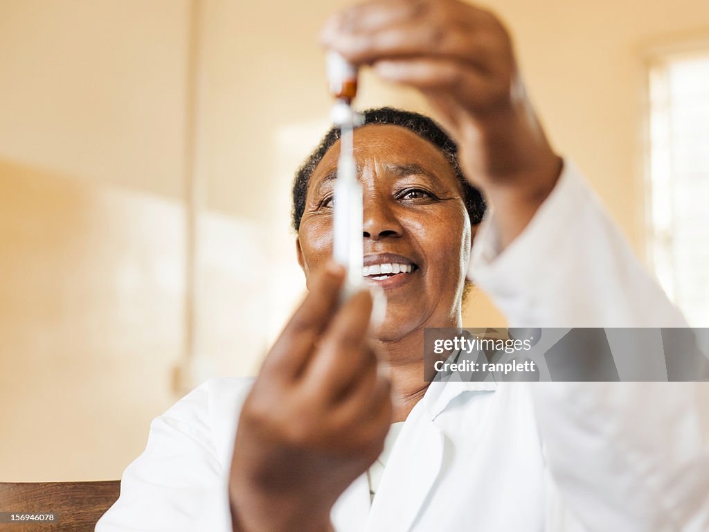 African Nurse with a Vaccine