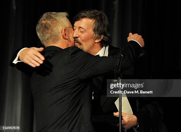 Stephen Daldry accepts an award from Stephen Fry at the 58th London Evening Standard Theatre Awards in association with Burberry at The Savoy Hotel...