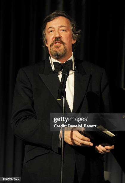 Stephen Fry presents an award at the 58th London Evening Standard Theatre Awards in association with Burberry at The Savoy Hotel on November 25, 2012...