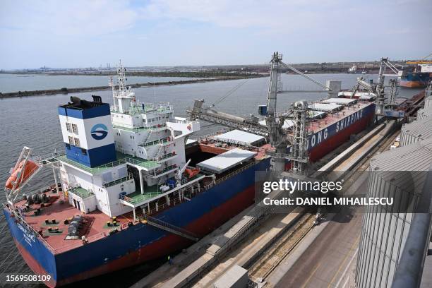 Ship is loaded with rapeseeds at "COMVEX" grain terminal in Constanta harbor, Romania on July 31, 2023. Since the beginning of the war in...