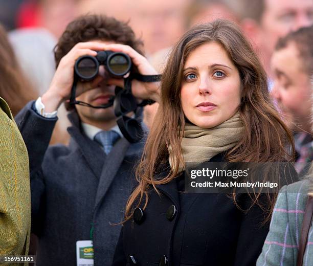 Sam Waley-Cohen and wife Annabel Waley-Cohen watch The Paddy Power Gold Cup horse race as they attend The Open meet at Cheltenham Racecourse on...