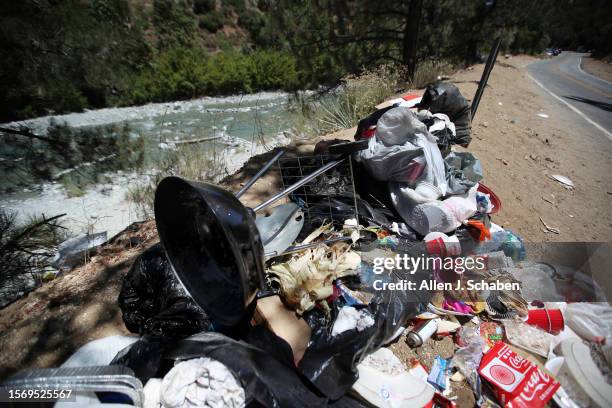 San Gabriel Mountains National Monument, CA Trash piles up along the East Fork of the San Gabriel River in the San Gabriel Mountains National...