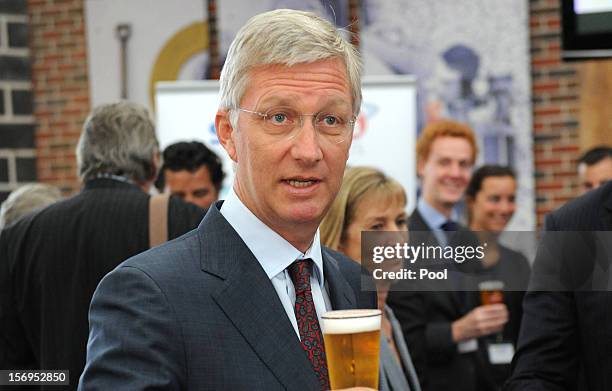 Prince Philippe of Belgium drinks a Crown Lager beer at Carlton BrewHouse on November 26, 2012 in Melbourne, Australia. Prince Philippe is on a...