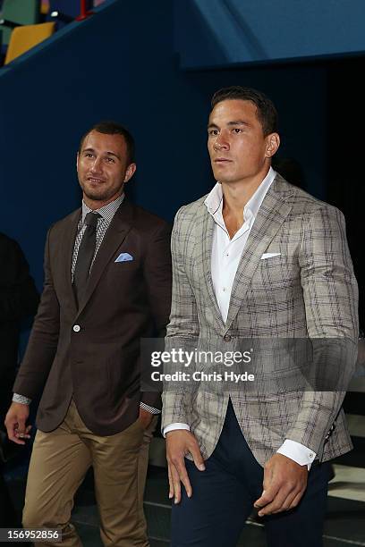 Quade Cooper and Sonny Bill Williams arrive to speak to the media during a press conference at Brisbane Entertainment Centre on November 26, 2012 in...