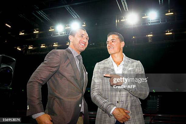 Australian Wallaby fly-half Quade Cooper and former New Zealand All Black Sonny Bill Williams attend a press conference in Brisbane on November 26,...