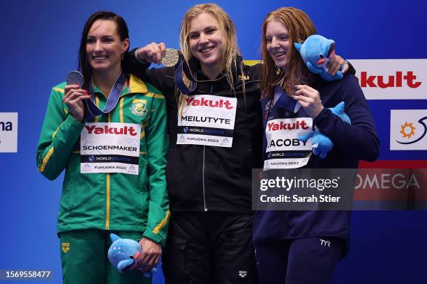 Silver medallist Tatjana Schoenmaker of Team South Africa, gold medallist Ruta Meilutyte of Team Lithuania and bronze medallist Lydia Jacoby of Team...