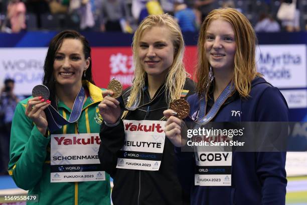 Silver medallist Tatjana Schoenmaker of Team South Africa, gold medallist Ruta Meilutyte of Team Lithuania and bronze medallist Lydia Jacoby of Team...