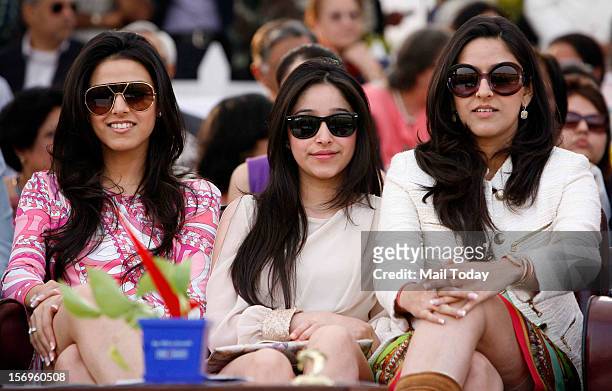 Yes bank boss Rana Kapoor's daughters, Rakhi in pink and Radha in white with a friend during Yes Bank India Masters Polo 2012 Trophy in New Delhi on...