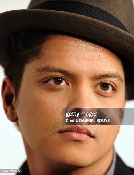 Singer Bruno Mars poses in the press room at the Grammy Nominations Concert, December 1, 2010 at Club Nokia in downtown Los Angeles. The 53rd annual...