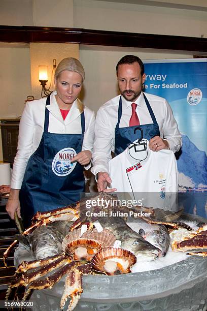 Crown Prince Haakon of Norway and Crown Princess Mette-Marit of Norway take part in a Norwegian seafood promotion,master class, at The Shangri-La...