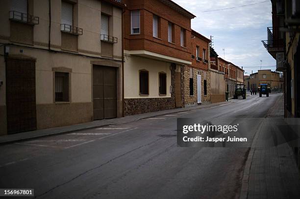 Tractors pass through emplty streets on November 23, 2012 in Villacanas, Spain. During the boom years, where in its peak Spain built some 800,000...