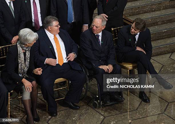 International Monetary Fund Director General Christine Lagarde, Mexican Central Bank Governor Agustin Carstens, German Finance Minister Wolfgang...