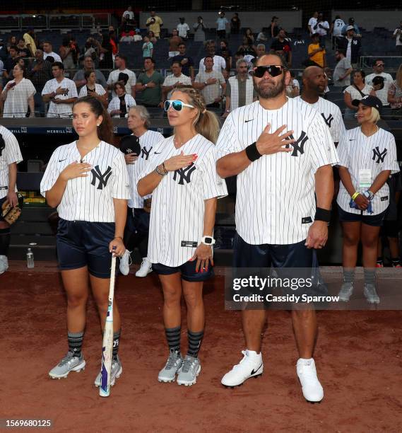 Tara Bernstein, Michelle Damon and Johnny Damon attend CC Sabathia & Friends Celebrity Softball Game at Yankee Stadium on July 24, 2023 in New York...