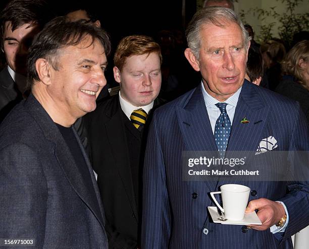 Prince Charles, Prince of Wales meets chef Raymond Blanc at a reception during an official visit to Carshalton Boys Sports college with Jamie Oliver...