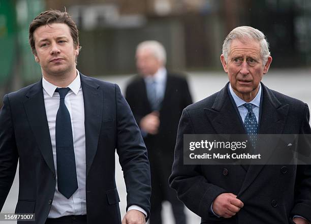 Prince Charles, Prince of Wales arrives with Jamie Oliver at Carshalton Boys Sports college to see how the school has transformed its approach to...