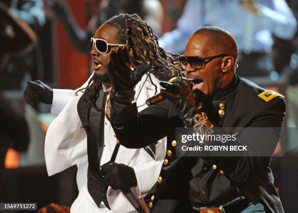 Jamie Foxx and T-Pain perform during the Grammy Show at the 52nd Grammy Awards in Los Angeles, California on January 31, 2010. AFP PHOTO/Robyn BECK