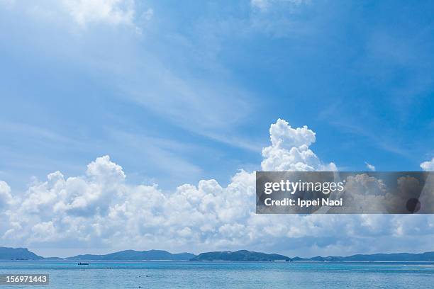 blue sky and cumulonimbus clouds over tropical sea - 入道雲 ストックフォトと画像