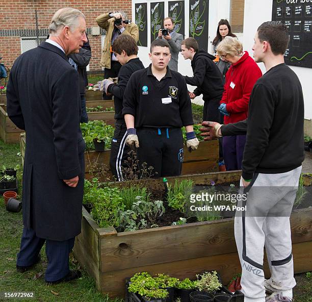 Prince Charles, Prince of Wales visits Carshalton Boys Sports College with Jamie Oliver to see how the school has transformed its approach to healthy...