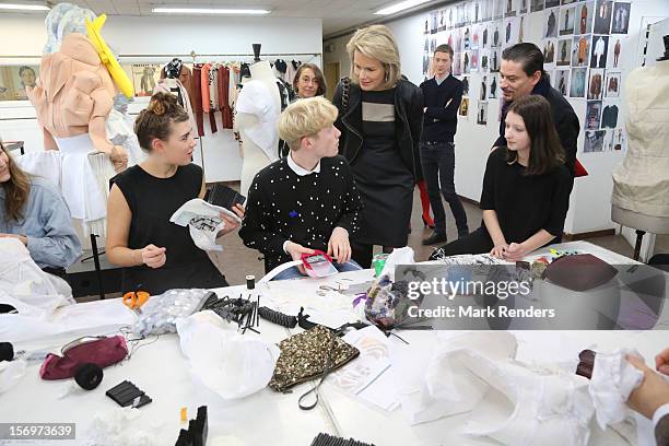 Princess Mathilde of Belgium talks to students during a visit at the ENSAV Arts Academy on November 26, 2012 in Brussels, Belgium.