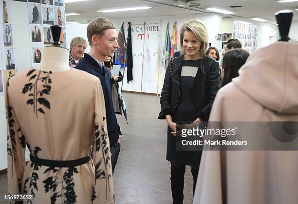 Princess Mathilde of Belgium talks to a student during a visit at the ENSAV Arts Academy on November 26, 2012 in Brussels, Belgium.