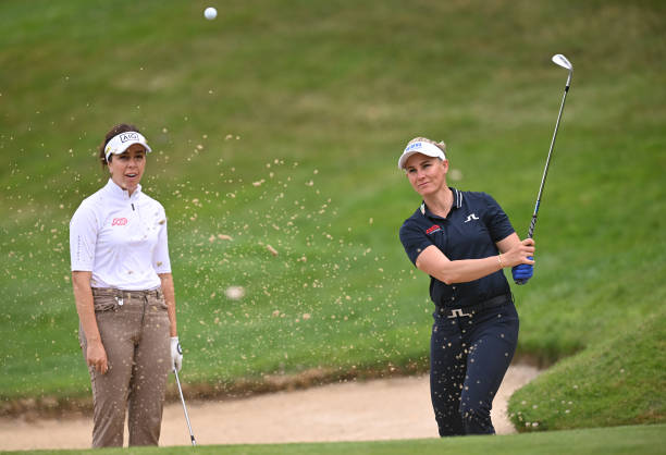 https://media.gettyimages.com/id/1569754153/photo/ryan-otoole-of-usa-plays-a-shot-whilst-being-watched-by-her-partner-georgia-hall-of-england.jpg?s=612x612&w=0&k=20&c=lSt1IqBaN8aDWbFplGnJQAyBHJn-xDxwegXRUuNhDvU=